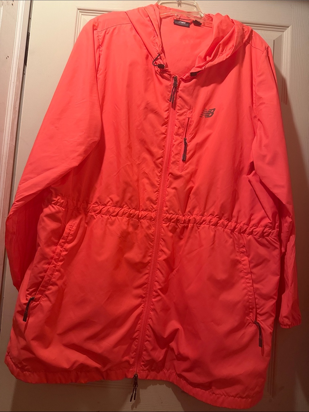 New Balance Women's Bright Coral Hooded Windbreaker Jacket